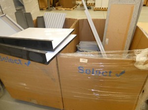 Pallet of monitor mounts, white boards, cube parts