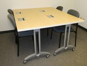 Two powered tables and 4 chairs