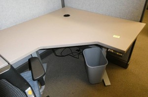 Adjustable height corner desk 48 inches each corner side against the wall