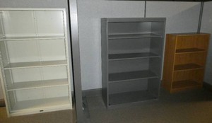 3 bookcases 2 steel and 1 wood