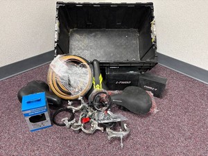 Plastic Crate with Many New Bike Parts