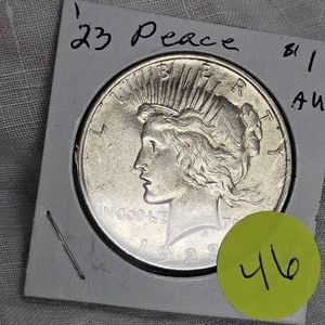1923 Peace Dollar $1, UNC with Slight Toning