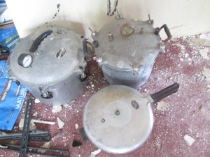 3 Pressure cookers...