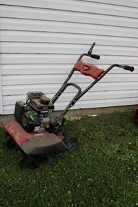 Earthquake front tine tiller works,...