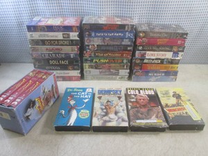 (EC1) 26 New Unopened VHS Movies (3...