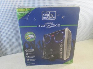 (D-2) The Singing Machine Portable ...