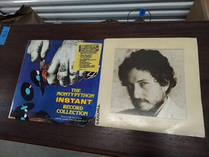 Lot Including Monty Python Instant Record Collection & Bob Dylan LPs