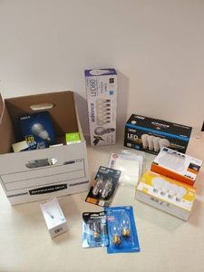 Box of Various unused Lightbulbs in Different shapes and sizes