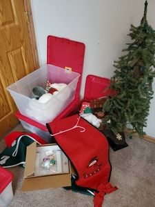 Various Christmas items, tree with lights, Teddy bear, runner and more