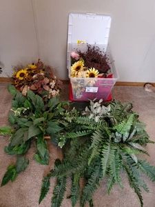 Various Faux Plants and Flowers for decorating plus storage bins.