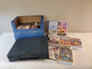 Working ProScan VCR and box of Various VHS tapes