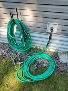 2 Quality Garden Hoses with sprayers and 2 sprinklers