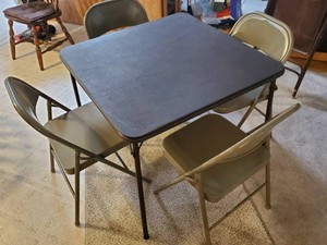 Lightly used Folding Card Table with 5 metal Folding Chairs
