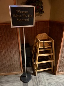 Childrens Booster Seats & Wait to be Seated Sign