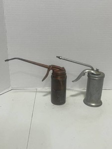 Pair of Vintage Metal Trigger Oil Cans Plews Oiler Company