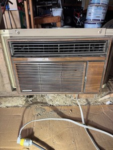 Vintage PanasonicQuasar Window Air Conditioner with Woodgrain Front