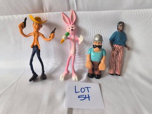 VINTAGE - 1970s Figurines Tonka People, Husky Helper, 2 Bendy Rubber Figurines- Lot of 4