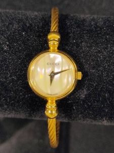 Gucci Pearl Dial Bangle Watch
