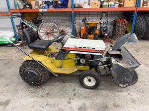Sears 146 Garden Tractor With Snowblower Attachment - items in background of tractor not inc