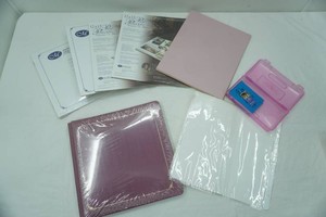 Scrapbook (unopened) and 12x12 page inserts