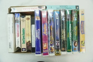 VCR tapes including Love Story, Secret Garden, Ritchie Rich and others
