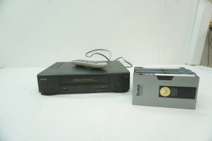 Sanyo VHS player with universal remote and blank tapes
