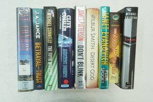 variety of hard cover novels from various authors