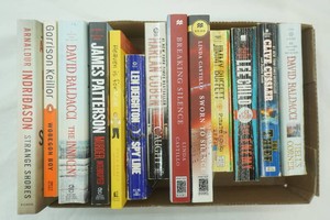 variety of paperback novels from various authors