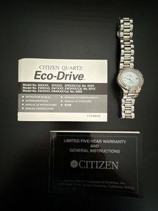 Citizen Eco-Drive Ladies WR100 MOP Dial Crystal Bezel Watch Manuals