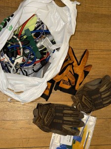 Box Lot of Assorted Bungee Cords Tie Downs Work Gloves Zip Ties