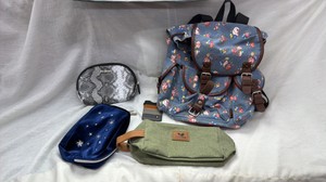 A lot of five handbag backpack style purses