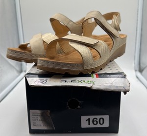 Brand New Womens size 7 128 Flex US brand, soft gold sandals