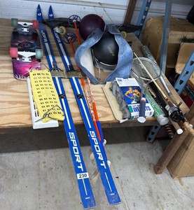 Large lot of vintage sporting goods, bowling balls, skis, skateboards, swing sets, swings, bats, fishing poles, tennis rackets