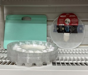 Large lot of Acrylic Egg Trays plus Nesco brand, snack, master, clean screen, and laptop, lap table top