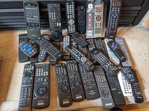 BOX LOADED WITH 32 REMOTE CONTROLS  ALL WORKING