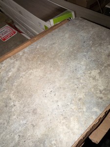 8 Boxes Gray Stone-Look Luxury Vinyl Plank Flooring  Covers Approximately 288 Sq. Ft.