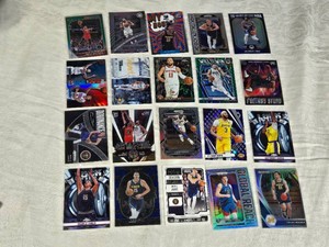 Lot of Basketball Cards Featuring Ja Morant, Nikola Jokic, and Giannis Antetokounmpo Including Prizm and Optic Special Editions with Holo and Global Reach Cards