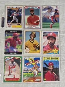 Lot of 9 Ozzie Smith Baseball Cards including 1985 All-Star and The Wizard Comic.