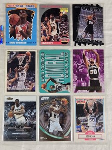 Lot of 9 David Robinson Basketball Cards including NBA Hoops Rookie, Fleer 90 All-Stars, and Topps Finest series.