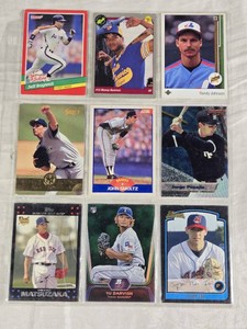 Lot of 9 Baseball Cards Featuring Players Like Randy Johnson, Jorge Posada, Cliff Lee, Manny Ramirez, John Smoltz, and Yu Darvish, including Rookies and Special Editions.