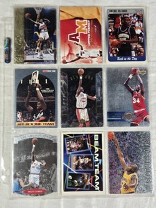 Lot of 9 Basketball Cards Featuring Hakeem Olajuwon, Alonzo Mourning, and Dikembe Mutombo with Special Inserts like Beam Team and All Rookie Team