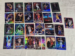 Lot of NBA Basketball Cards Featuring Players Like Kevin Durant, Kawhi Leonard, and Vince Carter, Highlighting Rookie and Holographic Features.