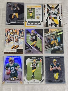 Lot of 9 Aaron Rodgers Football Cards featuring brands like Panini and Topps, including special editions like Ticket Masters and Super Bowl MVP.