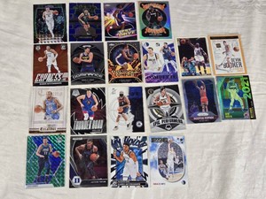 Lot of Basketball Cards Featuring Nikola Jokic, Luka Doncic, Giannis Antetokounmpo, and Others with Holo and Rookie Features