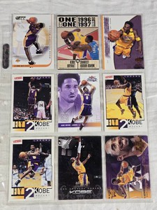 Lot of 9 Kobe Bryant Basketball Cards including Topps, Fleer, and Upper Deck from various years with special features such as Purple Reign and Panini.