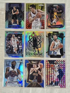 Lot of 9 Basketball Cards Featuring Dirk Nowitzki, Steven Adams, and Kevin Love