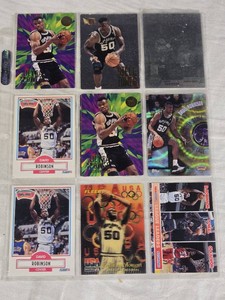 Lot of 9 David Robinson Basketball Cards featuring Fleer, Topps, and more with special features like Defining Moment and League Leaders.