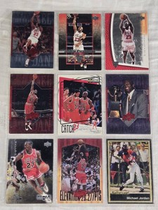Lot of 9 Michael Jordan Basketball Cards including Upper Deck Rookie Exclusives, Catch 23, and Elevation 29,277PTS