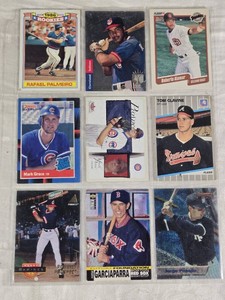 Lot of 9 Baseball Cards Featuring Players Like Rafael Palmeiro, Roberto Alomar, and Nomar Garciaparra