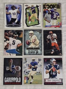 Lot of 9 Football Cards Featuring Steve McNair, Donovan McNabb, and Jimmy Garoppolo, Including Rookie Cards.
